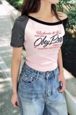 38952 ONE-SHOULDER CROPPED GRAPHIC TOP